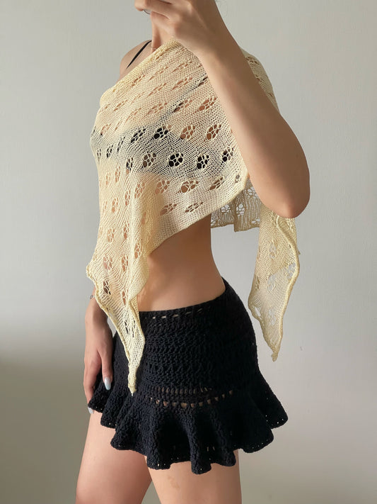 Not your regular poncho in beige
