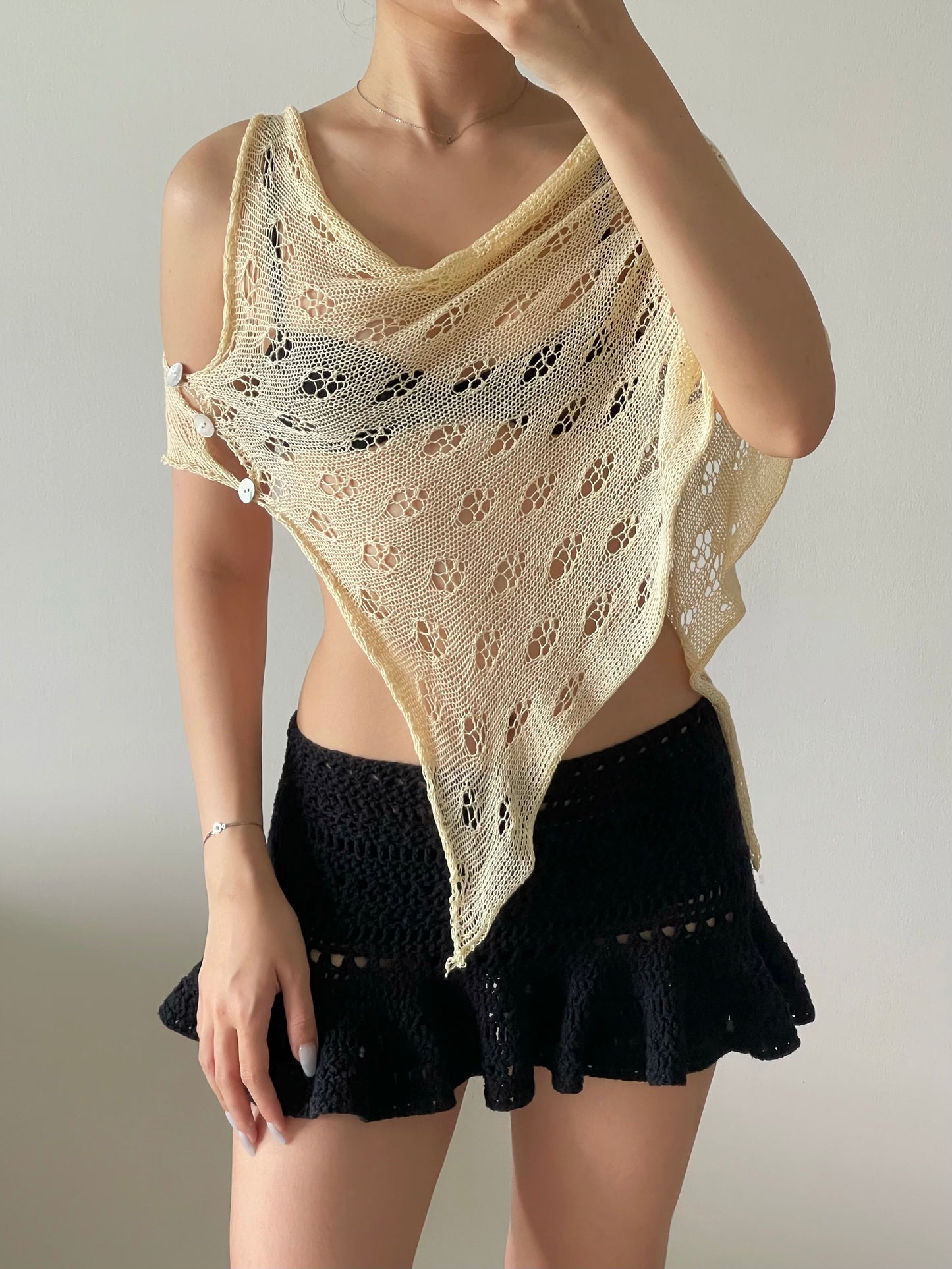 Not your regular poncho in beige