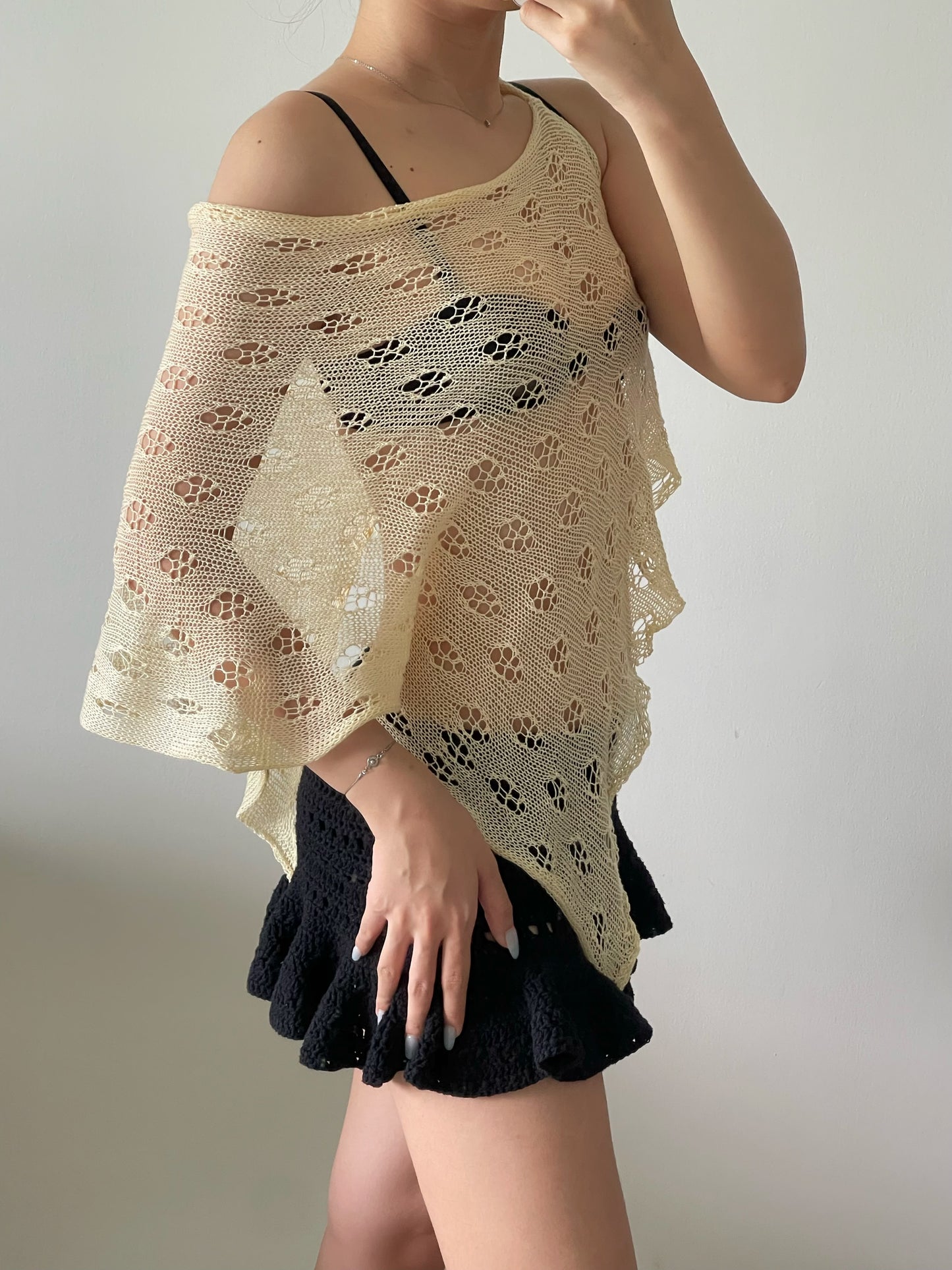 Not your regular poncho in beige