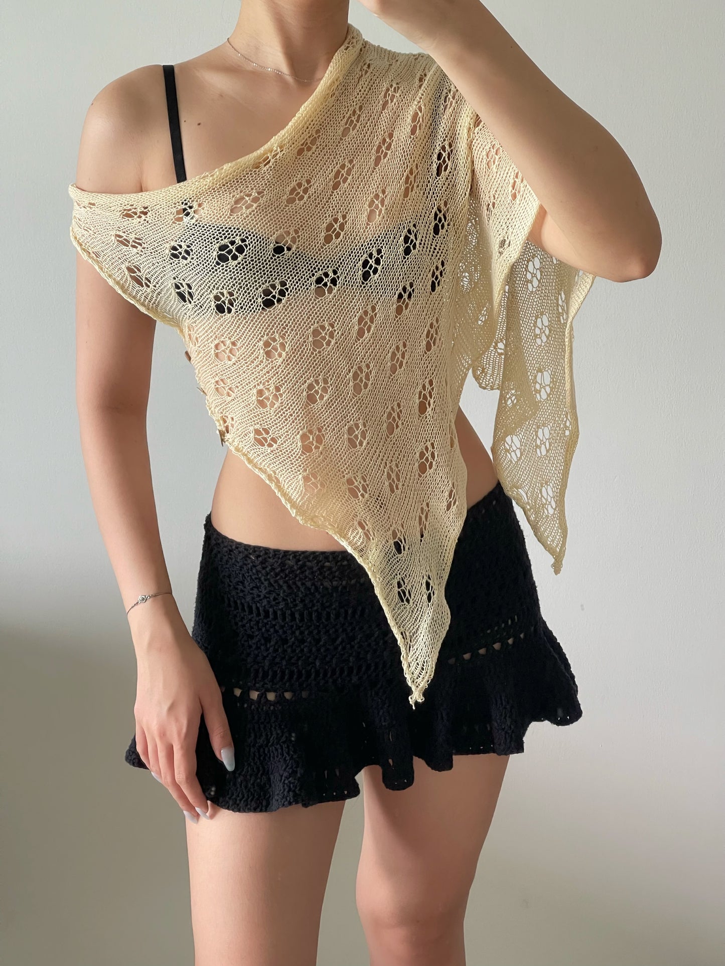 Not your regular poncho in beige